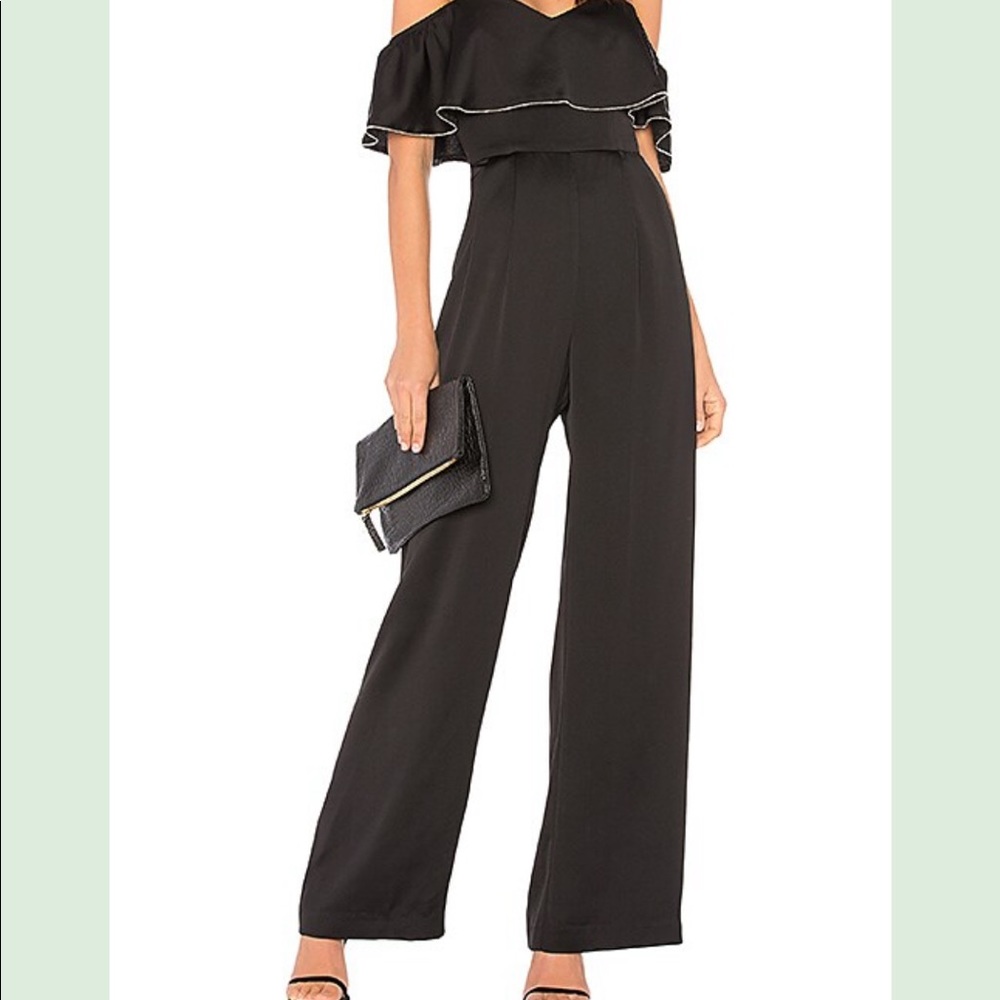Devlin Off Shoulder jumpsuit in black with Silver Tone Trim on Ruffle size 6